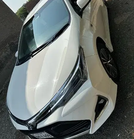 toyota grande white with black full