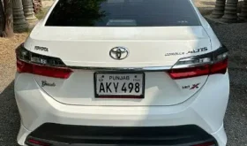 toyota grande white with black